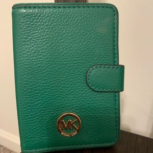 MK green wallet